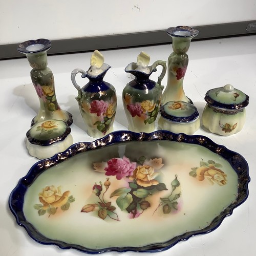 77 - Decorative floral painted vanity ceramic set