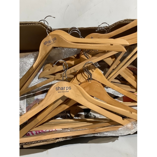 408 - Large quantity of good quality wooden hangers in very good condition