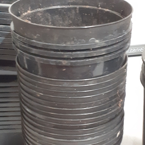 21 - Large quantity of plastic plant pots and trays. Used but good condition with no damage