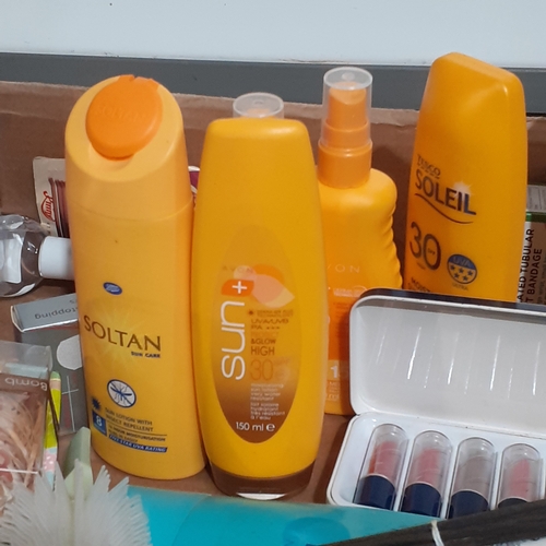 27 - Large lot of smellies and beauty products. Includes new Lynx, multiple sun tan lotions of which some... 