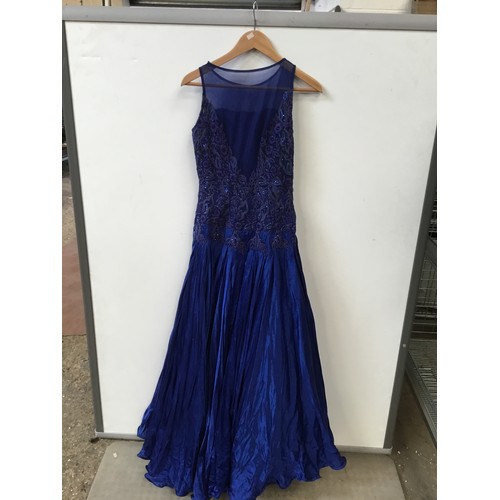 187 - Royal blue evening dress with net yoke  beaded and embroidered bodice and a full skirt with fluted h... 