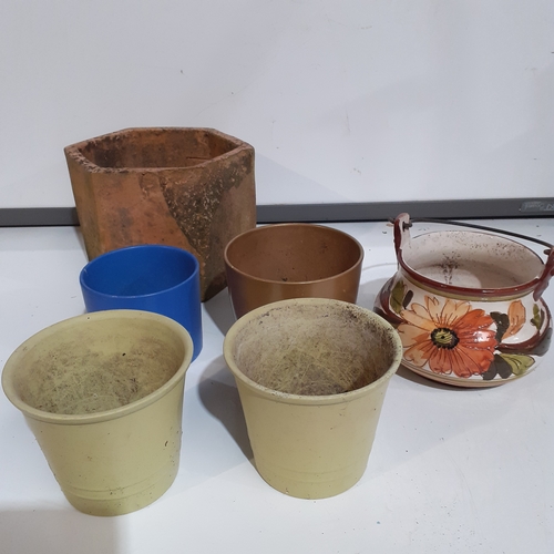 43 - Planter lot.Looks like hand painted carrying pot, detailed pattern with metal handle. Some well made... 