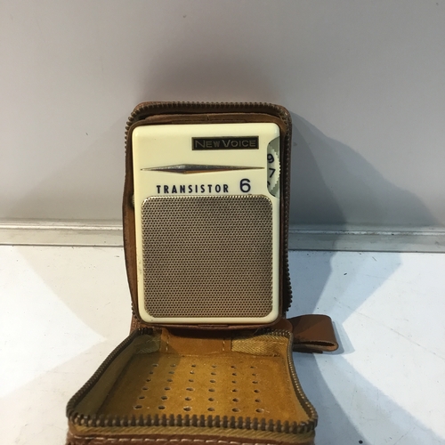 50 - New Voice Transistor 6 pocket radio with leather zipped case