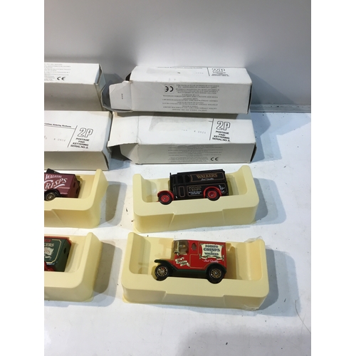 103 - Set of 4 boxed Walkers die cast vehicles