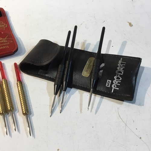 128 - Quantity of vintage darts - most with brass shafts