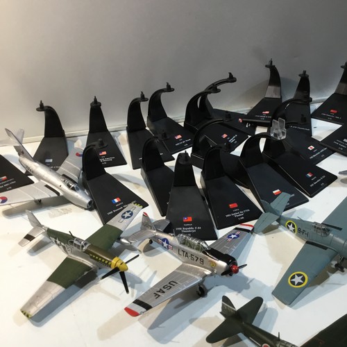 126 - Large quantity of metal war time planes - some with stands