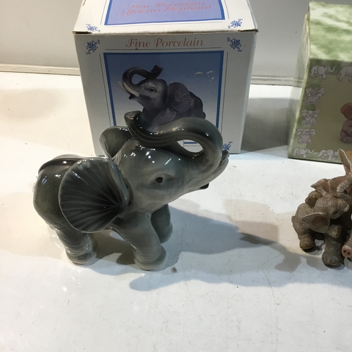 162 - Elephant ornaments inc fine porcelain African elephant & The Leonardo Collection ‘Trunkers’