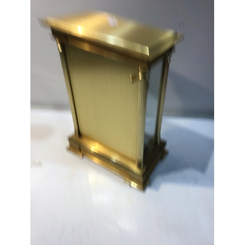 168 - Benchmark brass cased heavy battery operated mantle clock