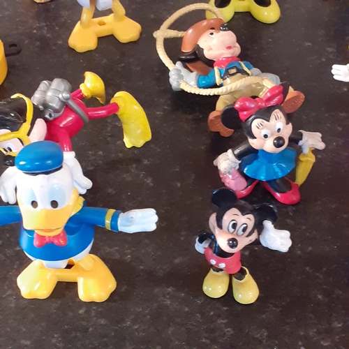 258 - Collection of Disney toys. Mostly 1980s. One from 1960s. Includes all main Disney characters in good... 