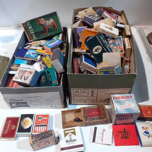 251 - 2 shoe boxes full of old, mostly vintage matchboxes and matchbooks. A lot contain original matches. ... 