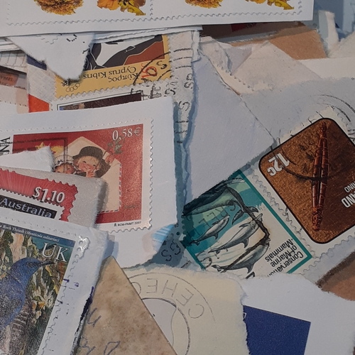 250 - Large quantity of postage stamps. Franked and unranked. As found from clearance and unsorted.