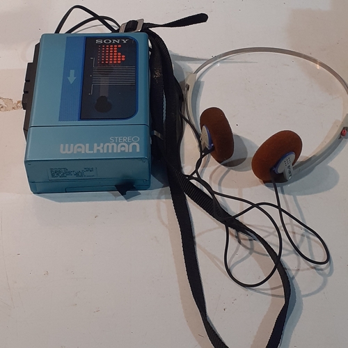 265 - Sony Walkman WM-9 Stereo cassette player and original Sony dynamic Stereo headphones. All are fully ... 