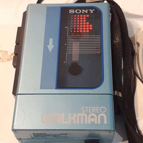 265 - Sony Walkman WM-9 Stereo cassette player and original Sony dynamic Stereo headphones. All are fully ... 