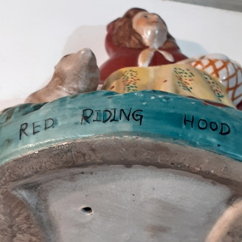 262 - Antique Red Riding Hood. Pottery ornament, most likely Staffordshire. Has age related crazing but no... 