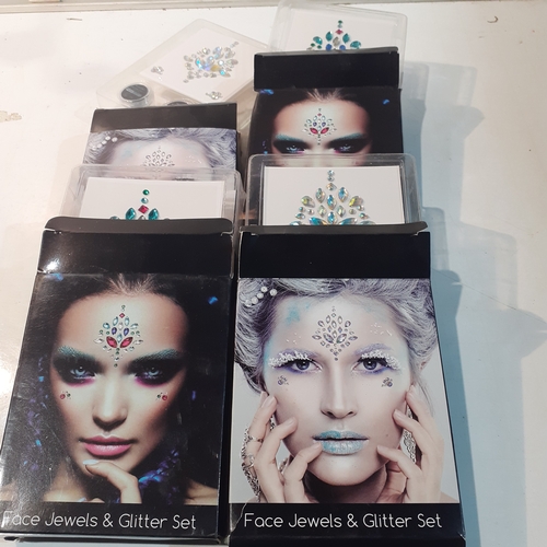 11 - 4 boxes of face glitter and face jewel sets as new.