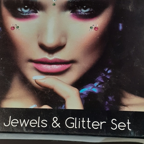 11 - 4 boxes of face glitter and face jewel sets as new.