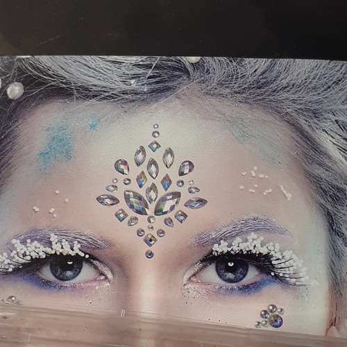 11 - 4 boxes of face glitter and face jewel sets as new.