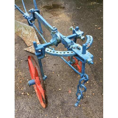 478 - Vintage Cooke manual push along plough - painted - wheels still move - approx 10ft long