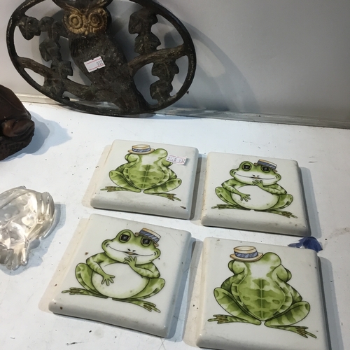 176 - Quantity of frog related items inc frog tiles, glass frog, metal trivet & more