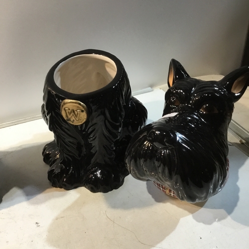 177 - Pair of black ceramic Scottish terrier dogs - one is a biscuit barrel