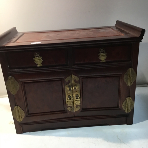 182 - Mahogany effect jewellery box with brass clasped detail