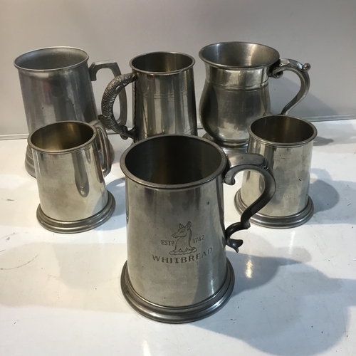 205 - Quantity of pewter tankards