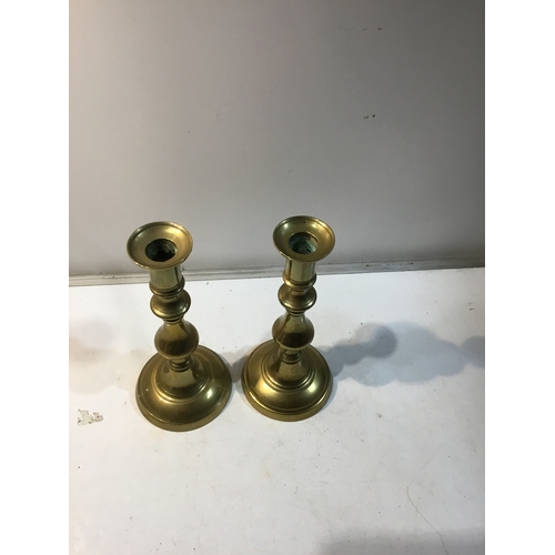 227 - Pair of brass candlestick holders