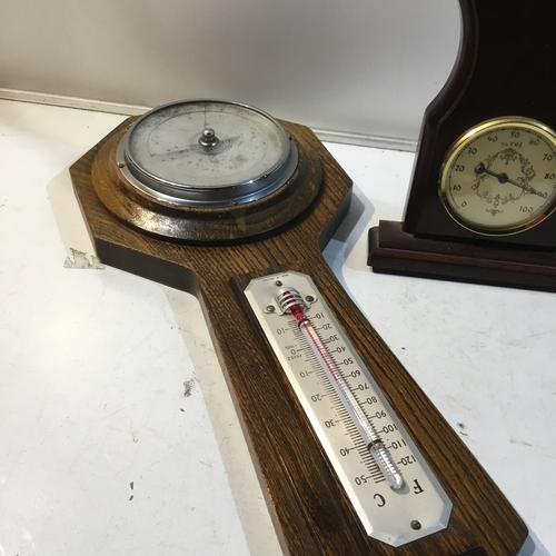 233 - Pair of oak backed barometers