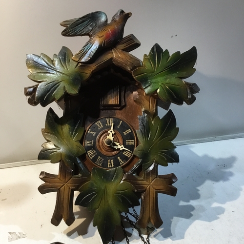 237 - Wooden cased cuckoo clock with weighs