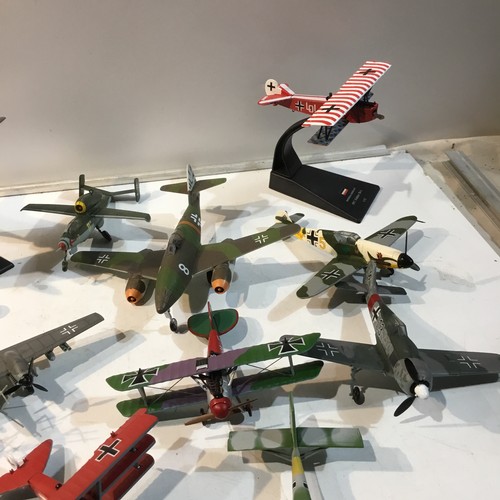 186 - Quantity of war time plastic plane models - some with stands