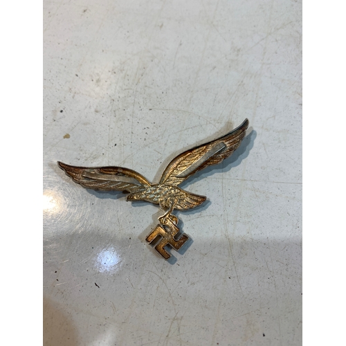 303 - WWII German cap badge with Swastika