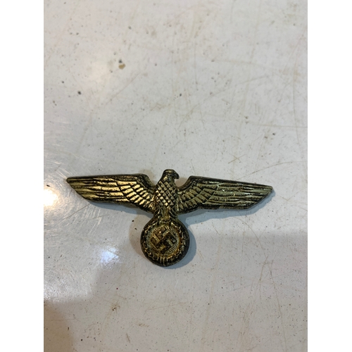 305 - WWII German cap badge with Swastika