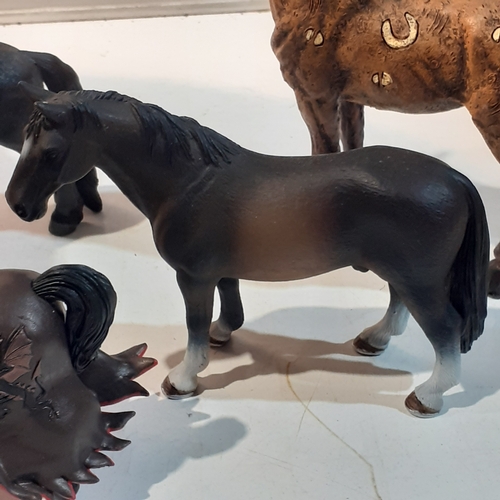 4 - Group of resin/moulded horse figures. Nice condition. Branded on the underside as shown in pictures.... 