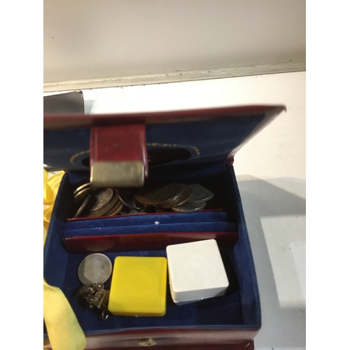 342 - Collection of crowns, ptas, one penny, Badges - in a small Jewellery box