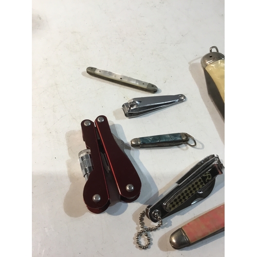 343 - Selection of nail clippers & penknifes