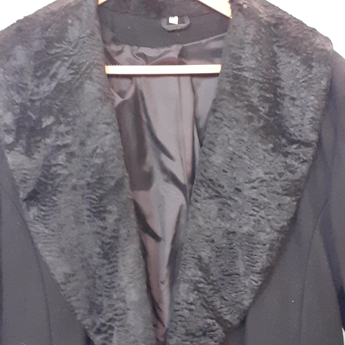 1 - Full length black woollen coat with faux fur trim. Labelled size 14 by Chanelle in good clean condit... 