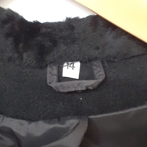 1 - Full length black woollen coat with faux fur trim. Labelled size 14 by Chanelle in good clean condit... 