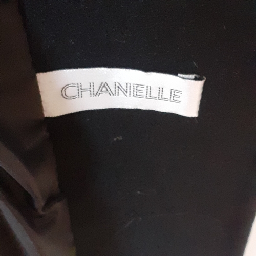 1 - Full length black woollen coat with faux fur trim. Labelled size 14 by Chanelle in good clean condit... 