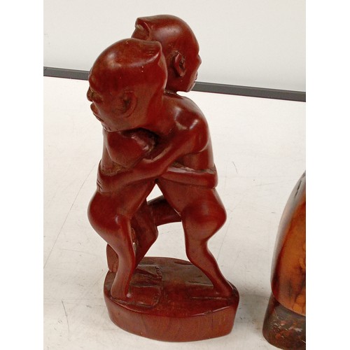 303 - 2 wooden ornaments. A man and an embracing pair, these are in solid wood with a very eye-catching de... 