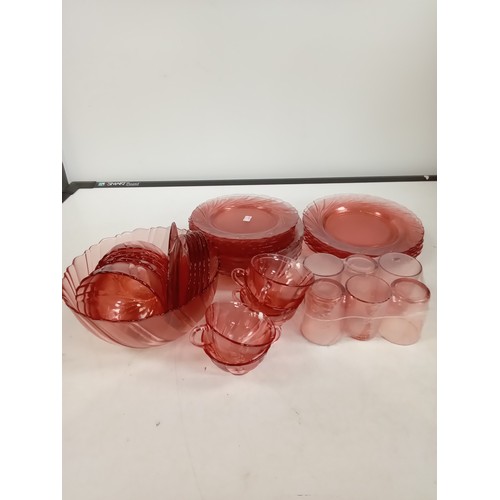 320 - French glass, Vereco pink coloured part dinner service. Good condition overall and some still in wra... 