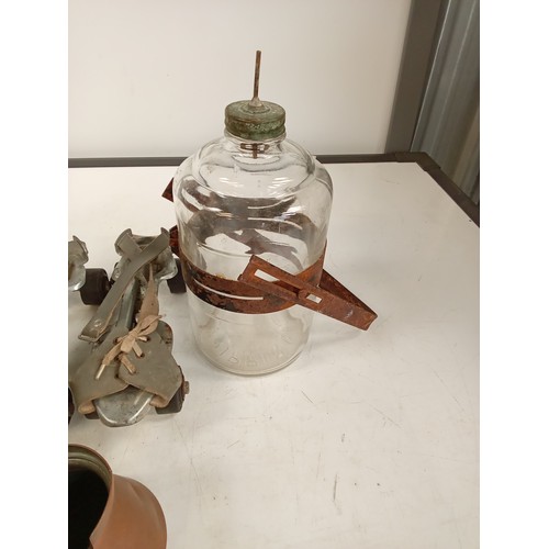 309 - Small vintage collectible lot comprising of a copper jug, vintage roller skates, a kerosene drip jar... 