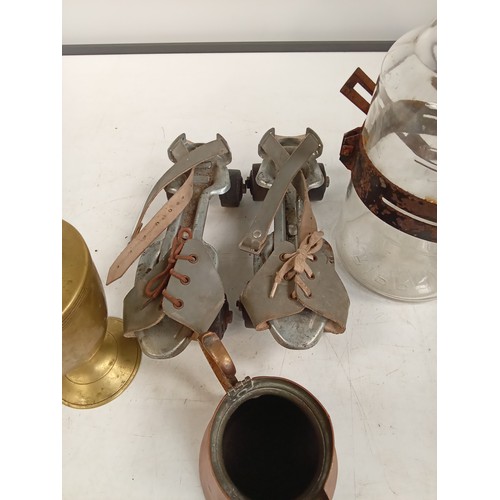 309 - Small vintage collectible lot comprising of a copper jug, vintage roller skates, a kerosene drip jar... 