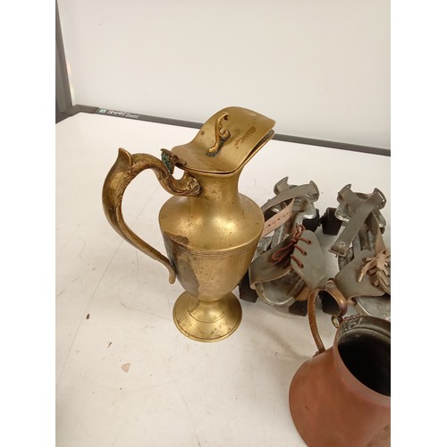 309 - Small vintage collectible lot comprising of a copper jug, vintage roller skates, a kerosene drip jar... 