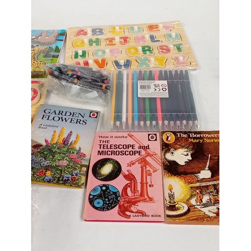 352 - Variety of children's wooden and other  learning toys in mostly as new condition with some read Puff... 