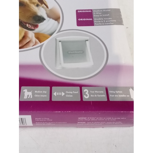 247 - Petsafe medium dog pet door flap. Boxed with instructions and fittings