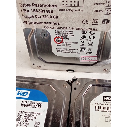 410 - Assortment of hard drives. 320GB, 500GB and others. Details showing in photos