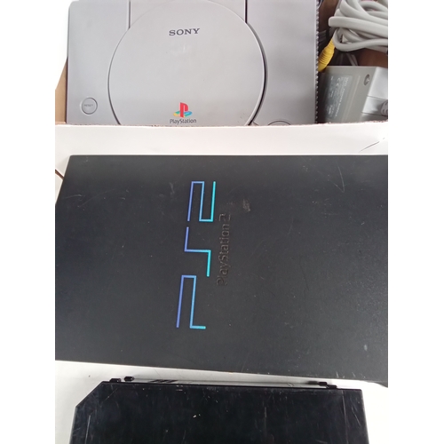 402 - Mixed gaming consoles. PS2, PS1, Wii etc. Some accessories