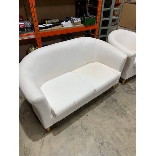 264 - White two-seater sofa and tub chair. Sturdy condition, could benefit from a clean