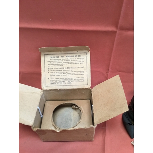 27 - Vintage gas mask with original card box