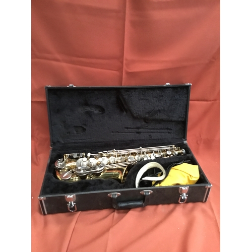 40 - Elkhart Vincent Bach international LTD brass saxophone with mouth pieces & case in fantastic conditi... 